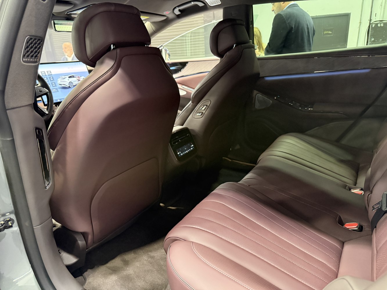Rear interior with luxurious leather seats and modern controls