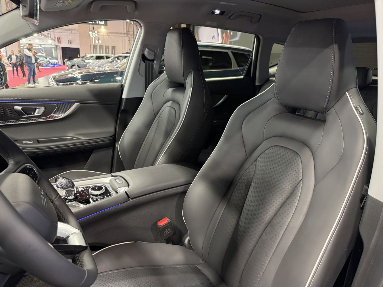 Luxury leather seats and modern center console with gear selector
