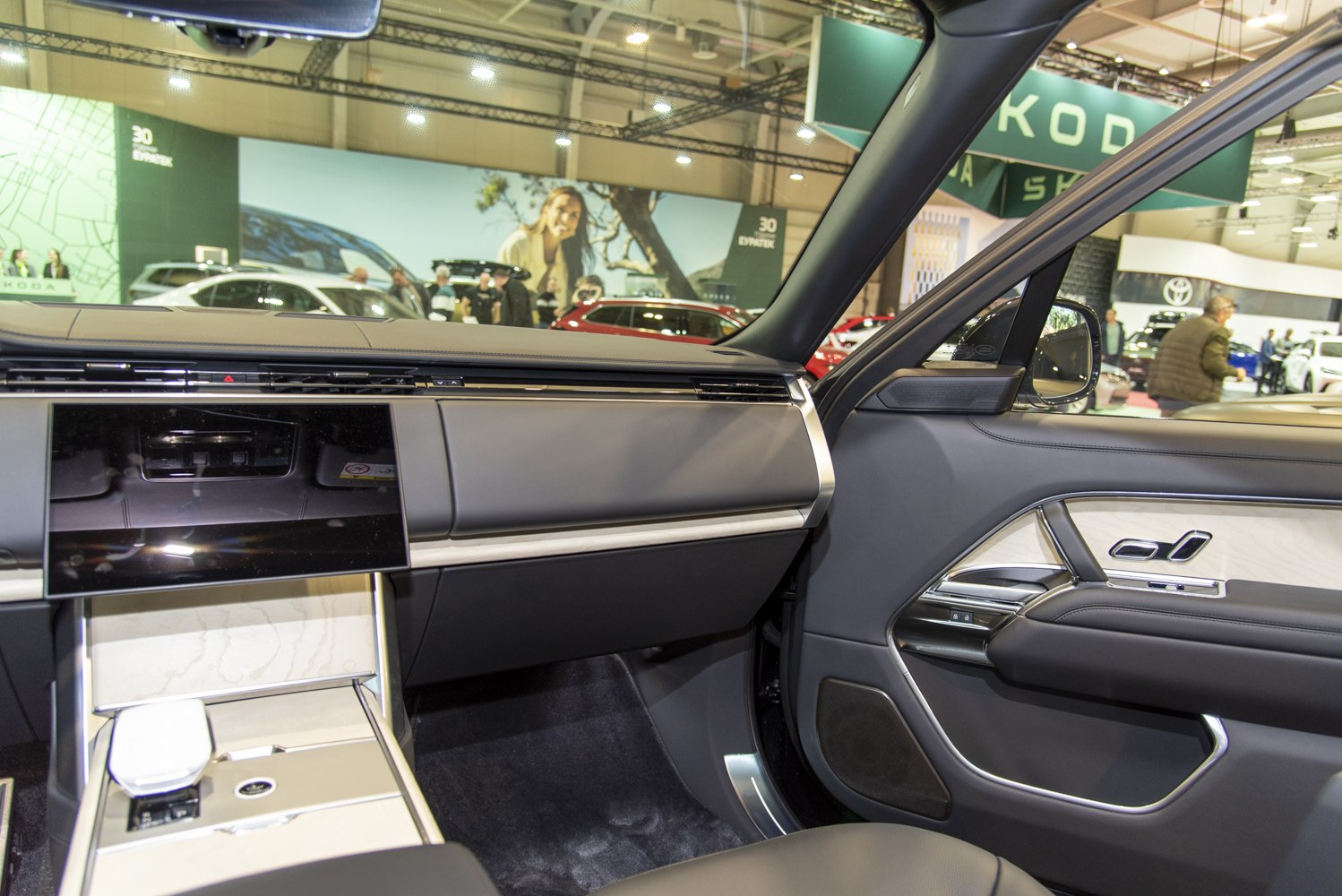 Front interior with touchscreen and premium door panel