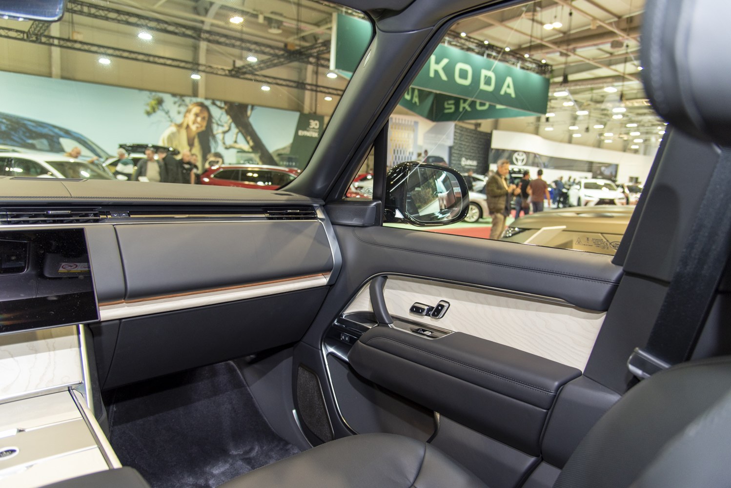 Passenger side interior with premium leather and wood trim