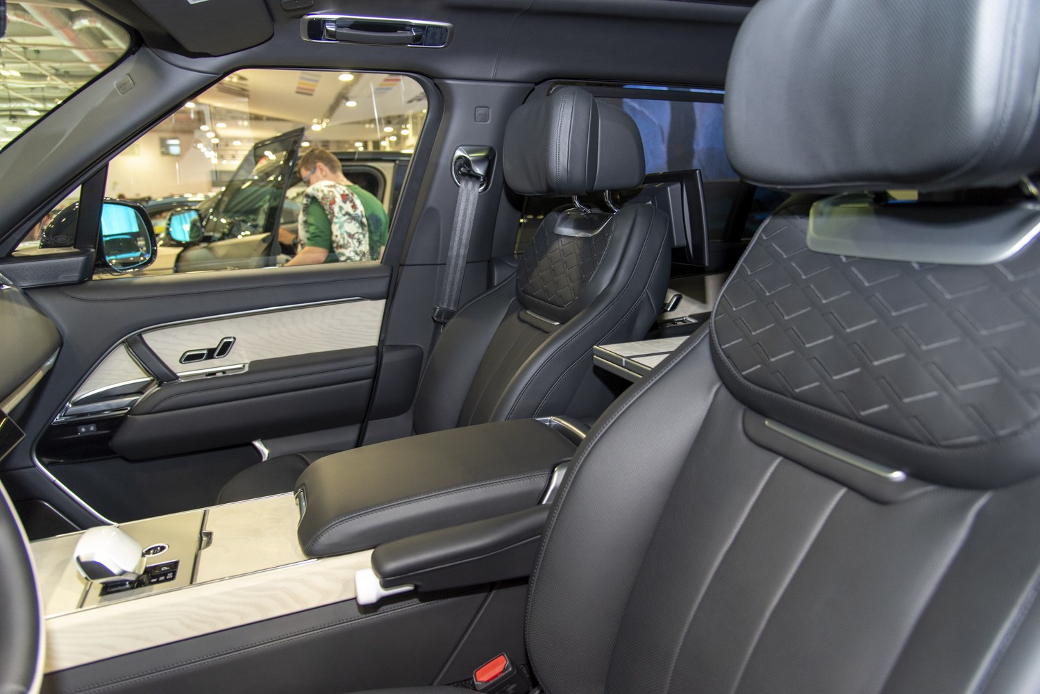 Quilted leather seats with wood trim and center armrest
