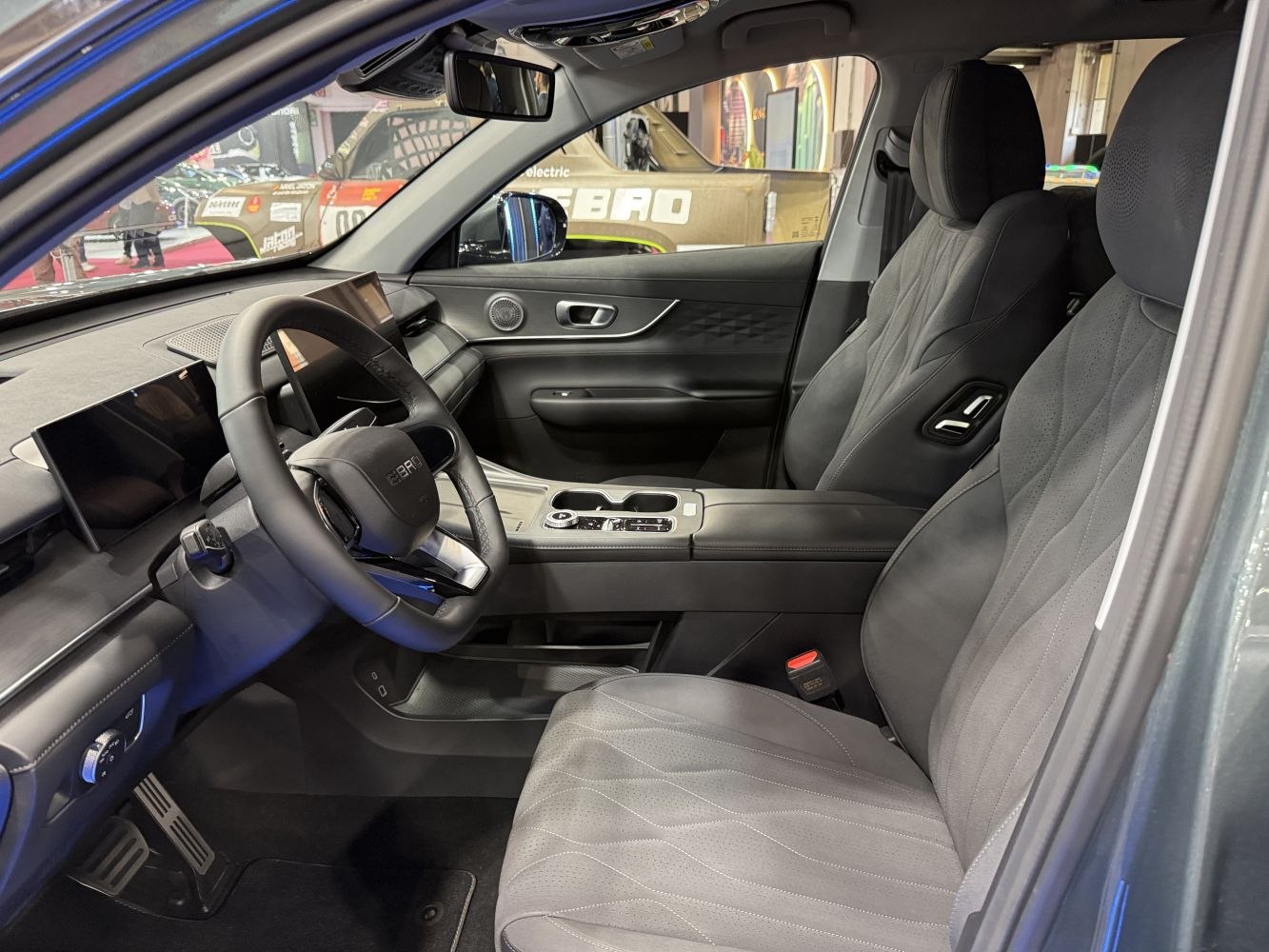 Modern dashboard and comfortable front seats with digital displays