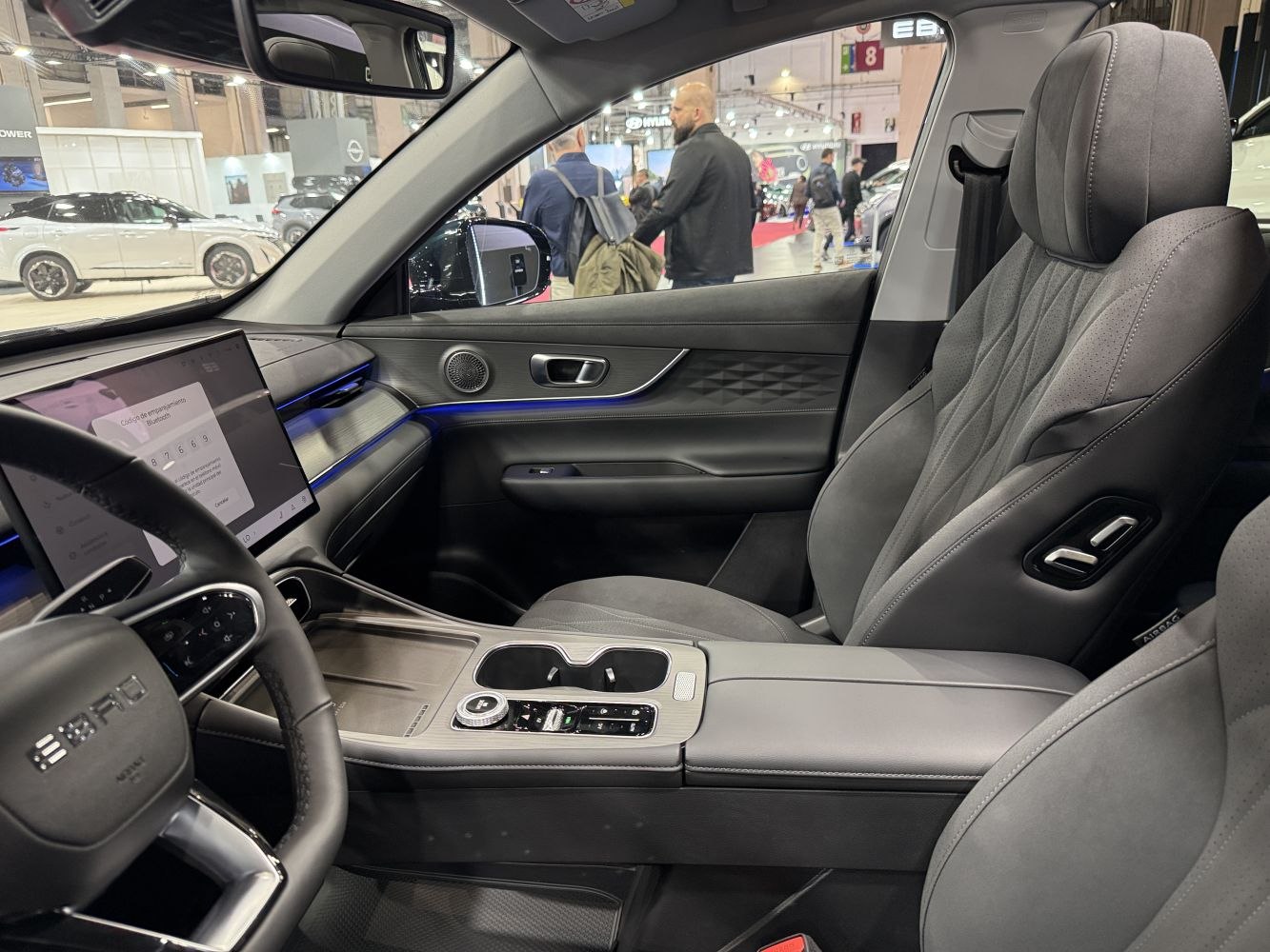 Digital dashboard, ergonomic front seating, ambient lighting