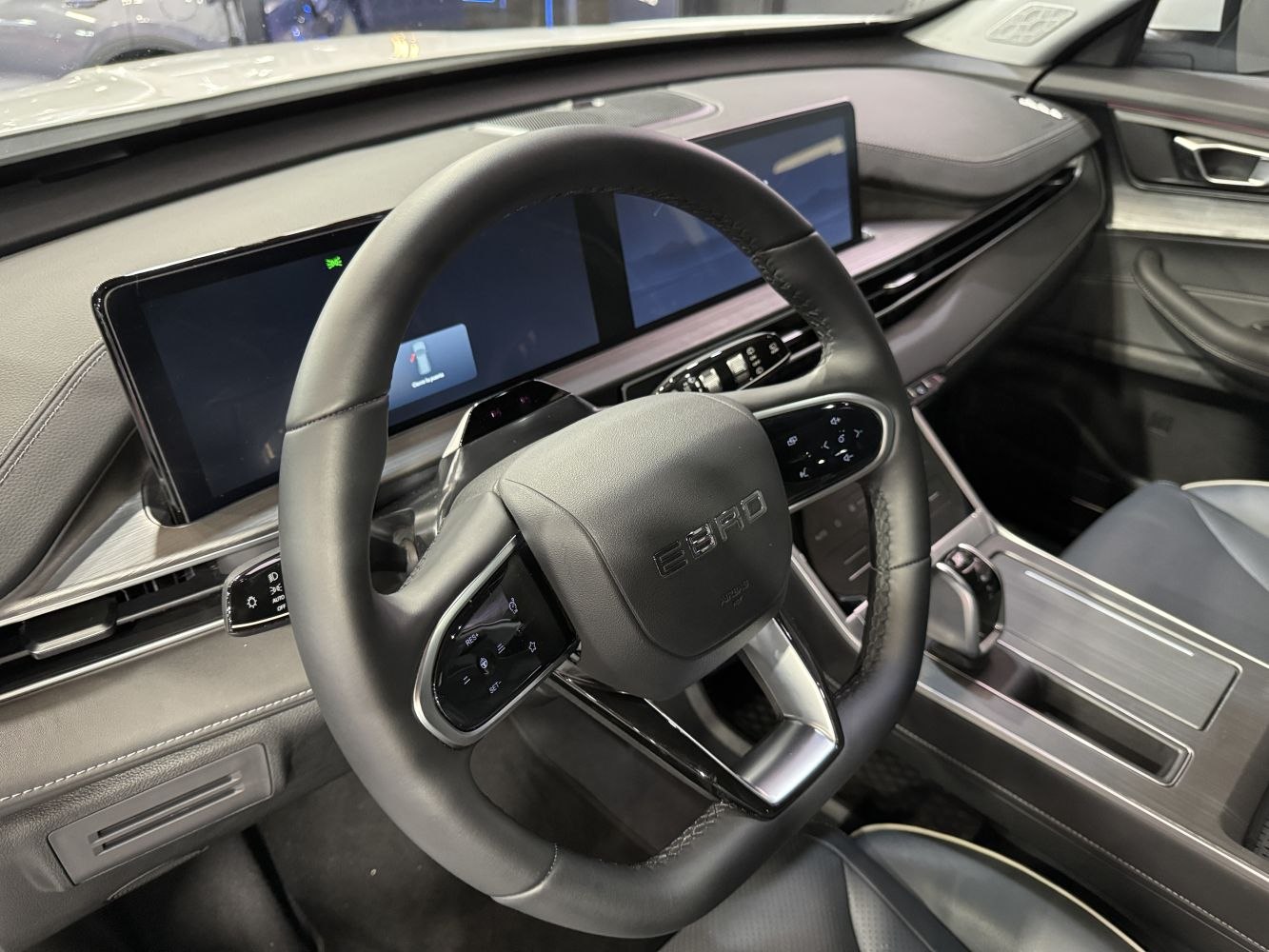 Modern digital dashboard with multifunction steering wheel