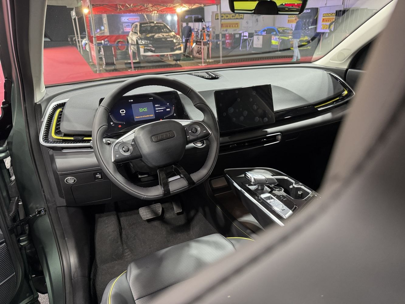 Digital dashboard and ergonomic steering wheel with central infotainment display