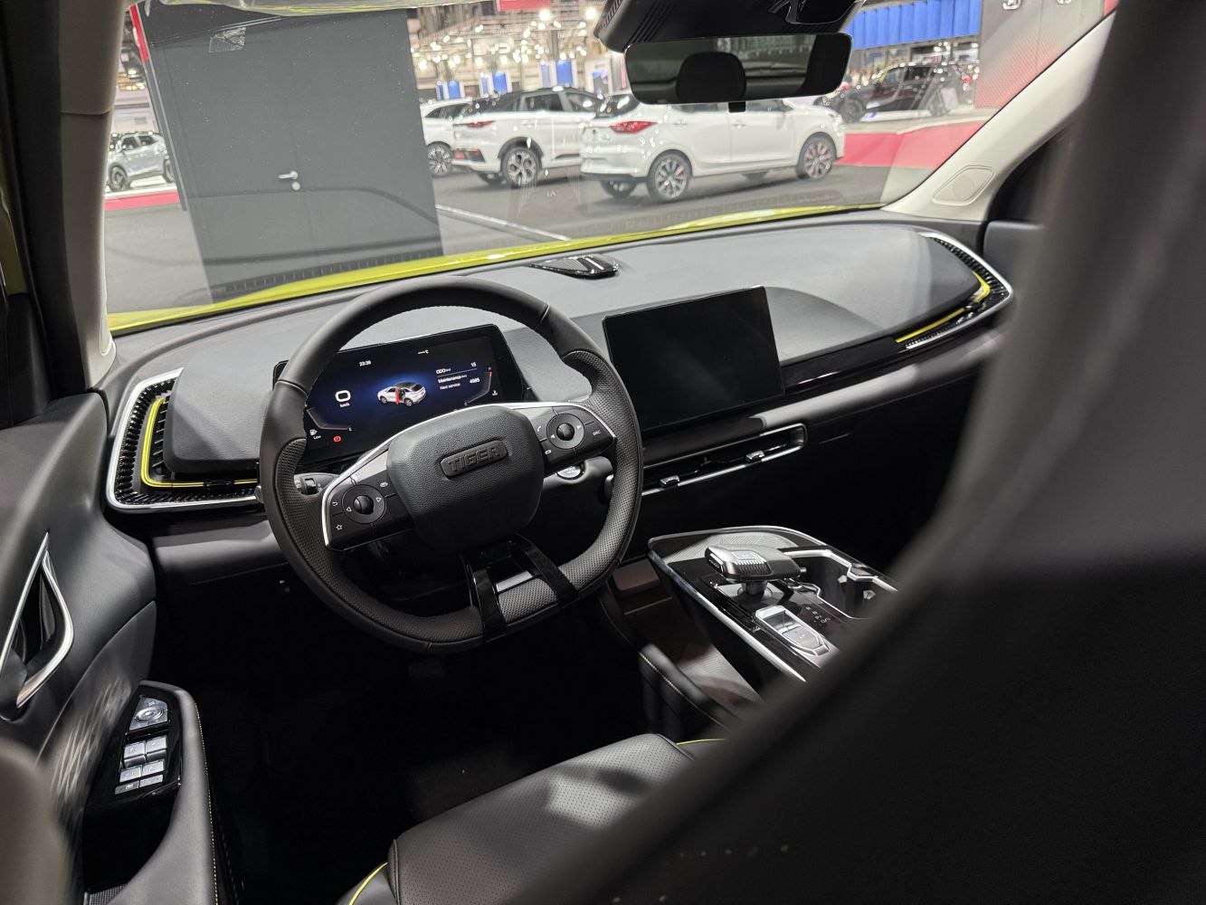 Digital instrument cluster and central touchscreen display in modern car interior