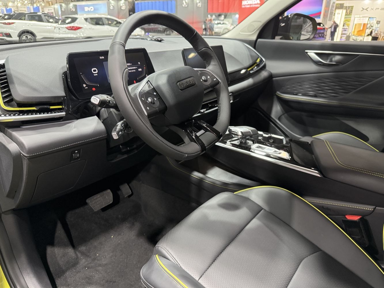 Digital instrument cluster and touchscreen infotainment in modern car interior