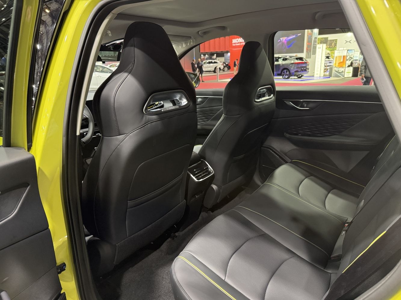 Rear interior with black leather seats and rear air vents