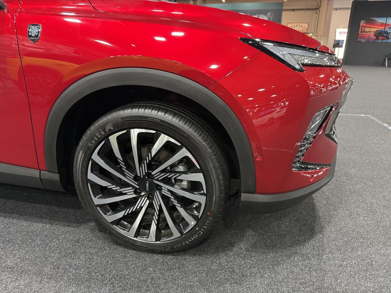 Stylish alloy wheel and sleek front light of a modern vehicle