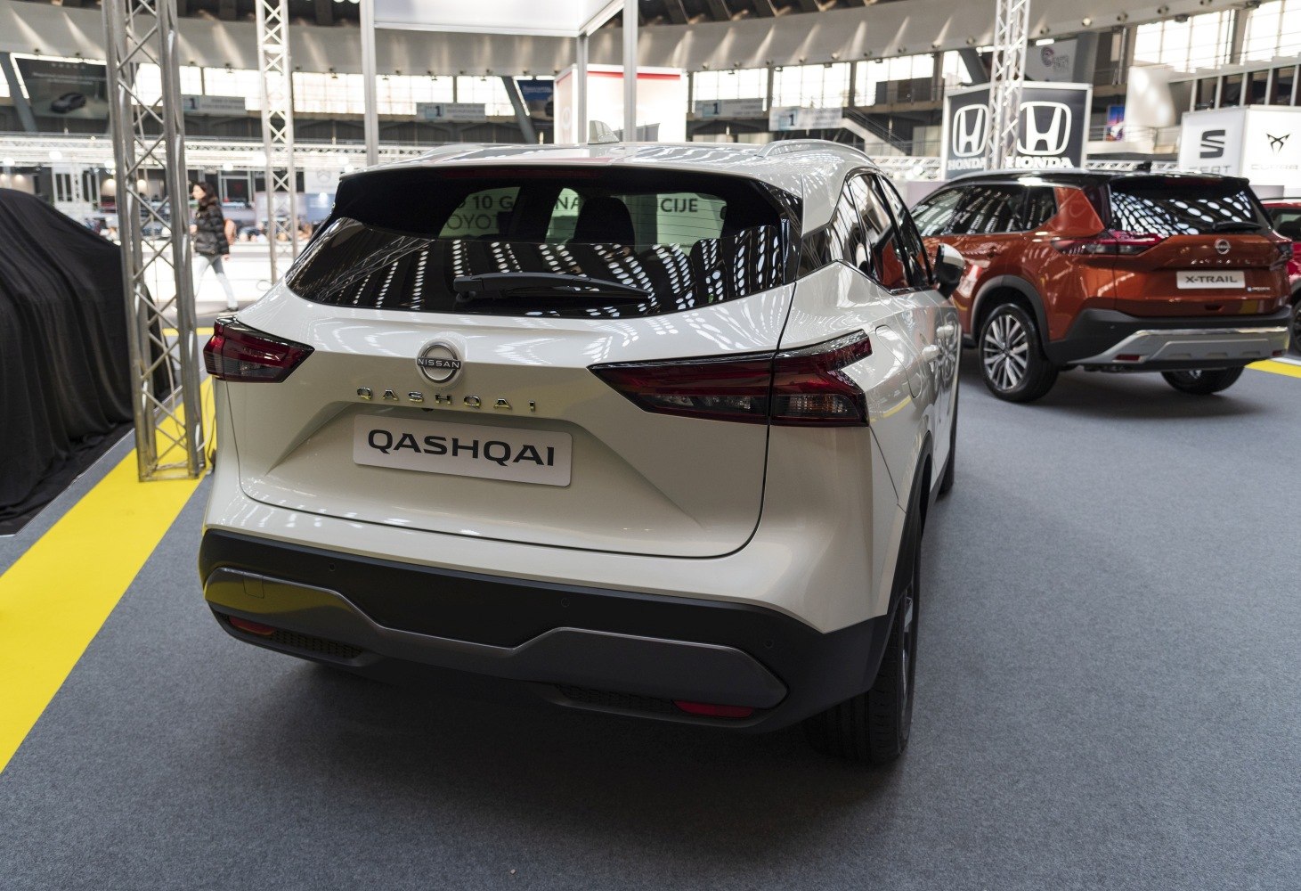 Rear view of a modern compact SUV with sharp taillights and hatchback design