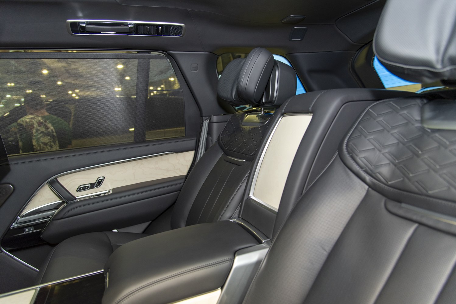 Luxury premium leather rear seats with quilted design and window sunshade