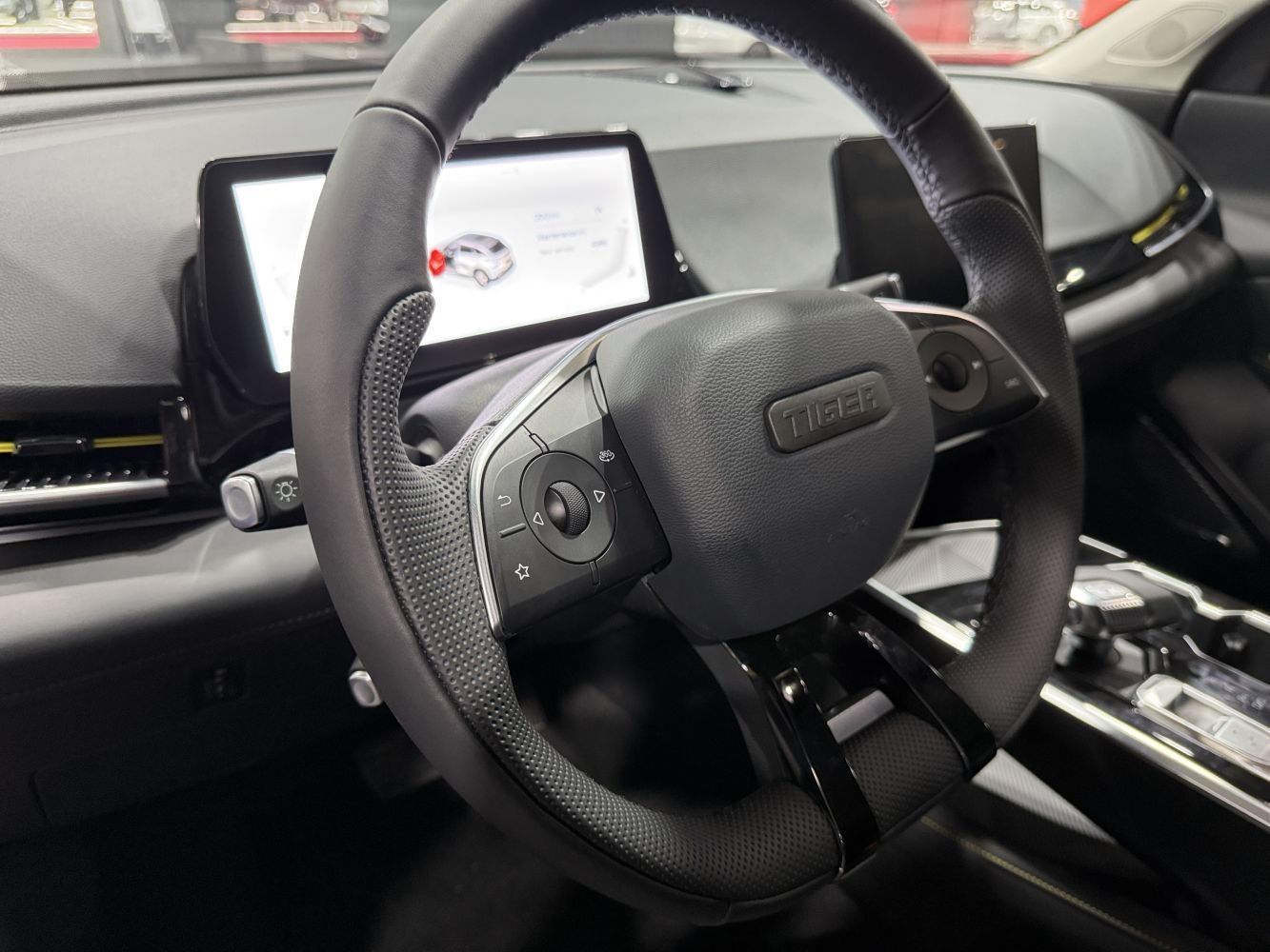 Steering wheel with integrated controls and digital dashboard display