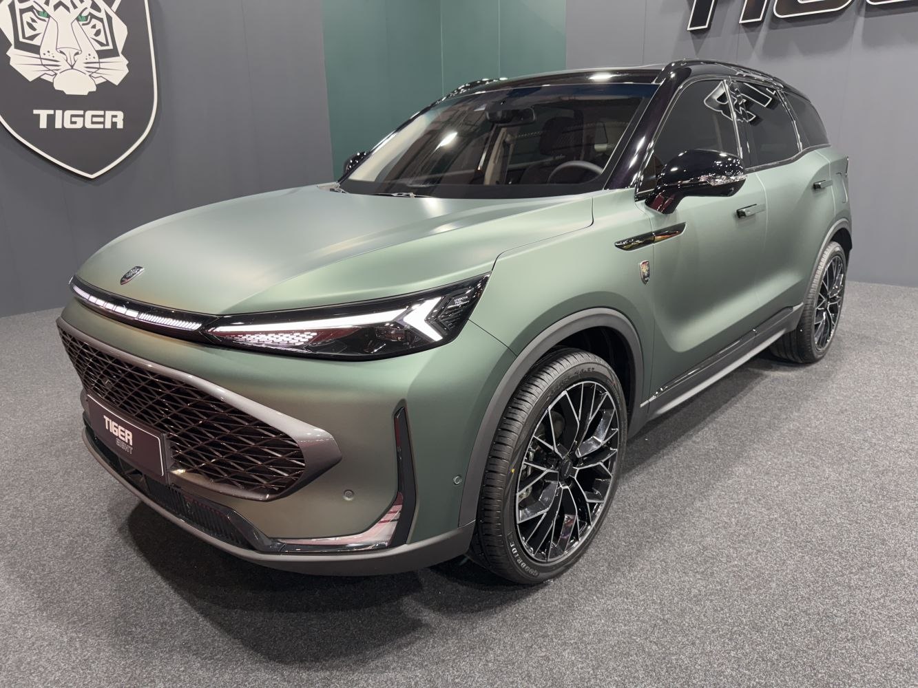 LED headlights and sporty multi-spoke alloy wheels on modern SUV front