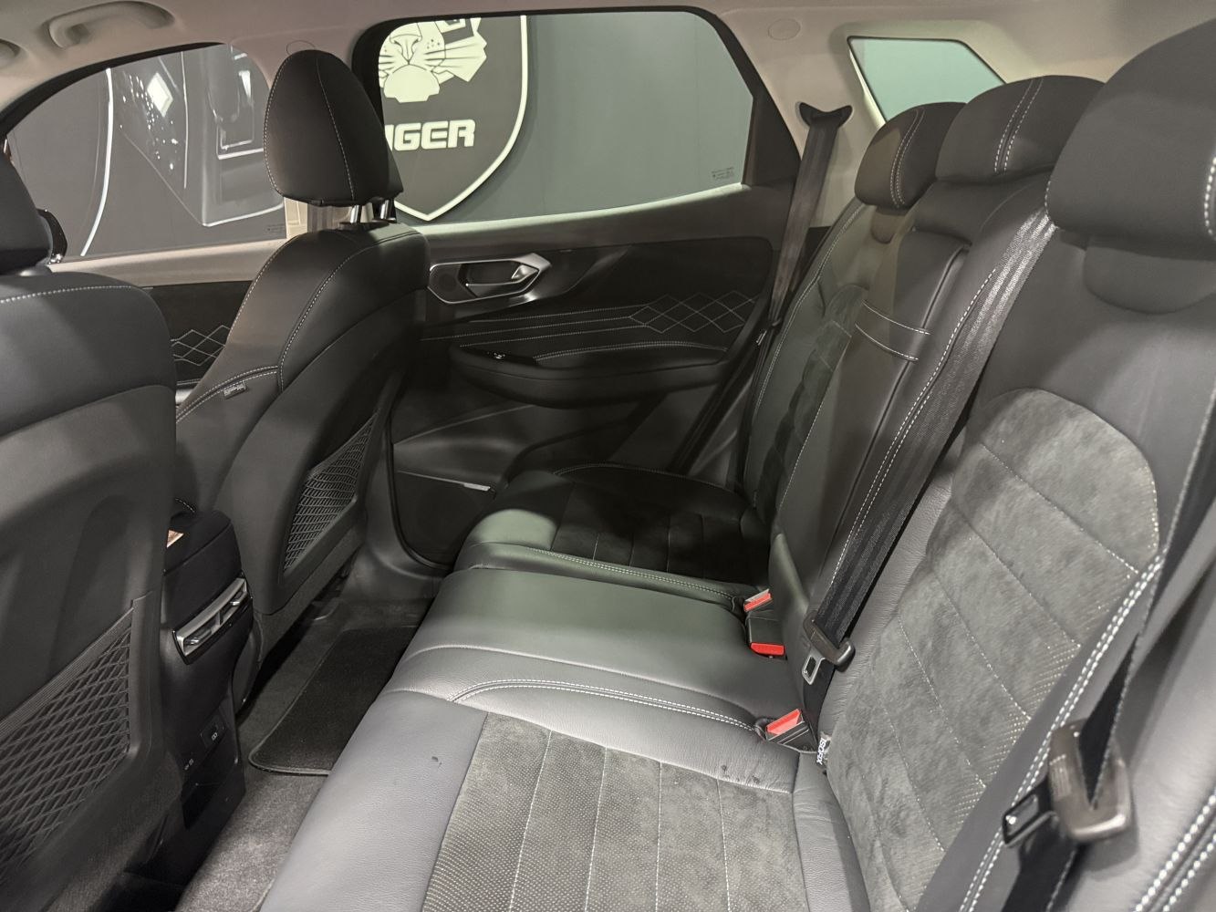Rear seat interior with premium upholstery and detailed stitching