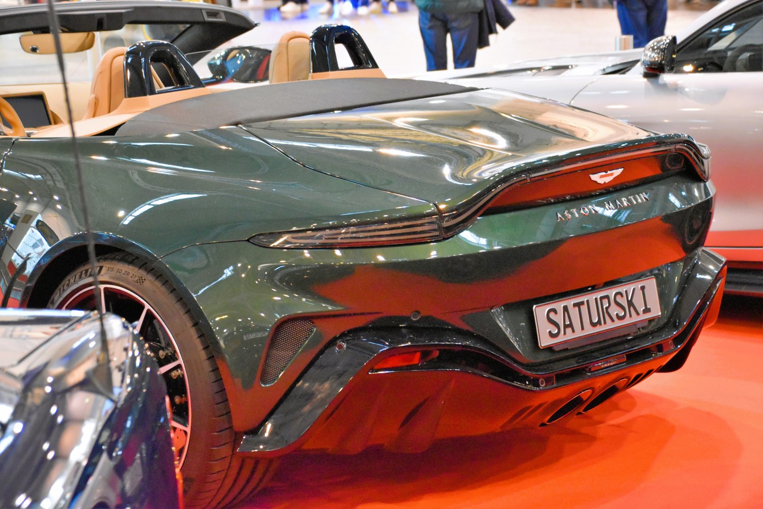 Detailed rear diffuser, sleek taillights, and aerodynamic body curves