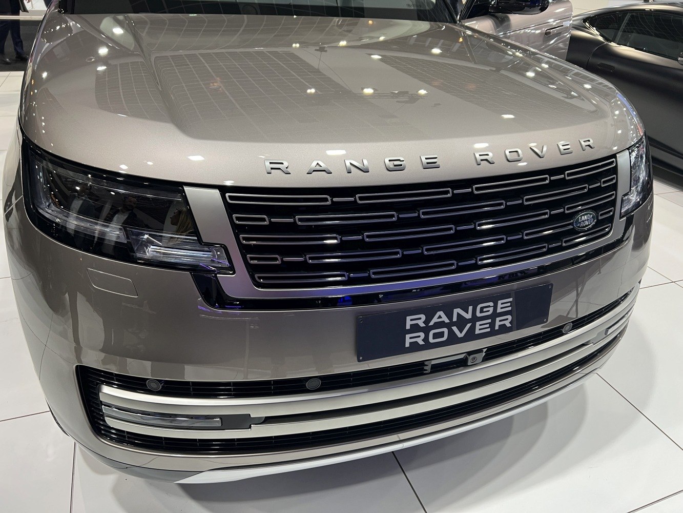 Close-up of front grille and LED headlights of luxury SUV