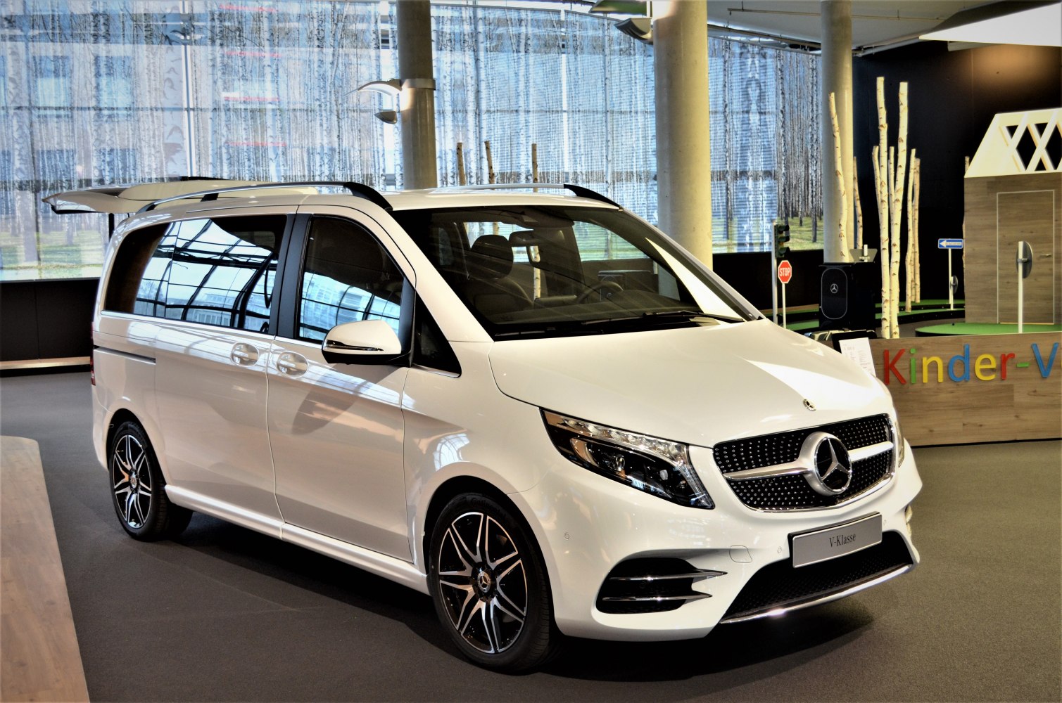 Luxury MPV with diamond grille and AMG style wheels