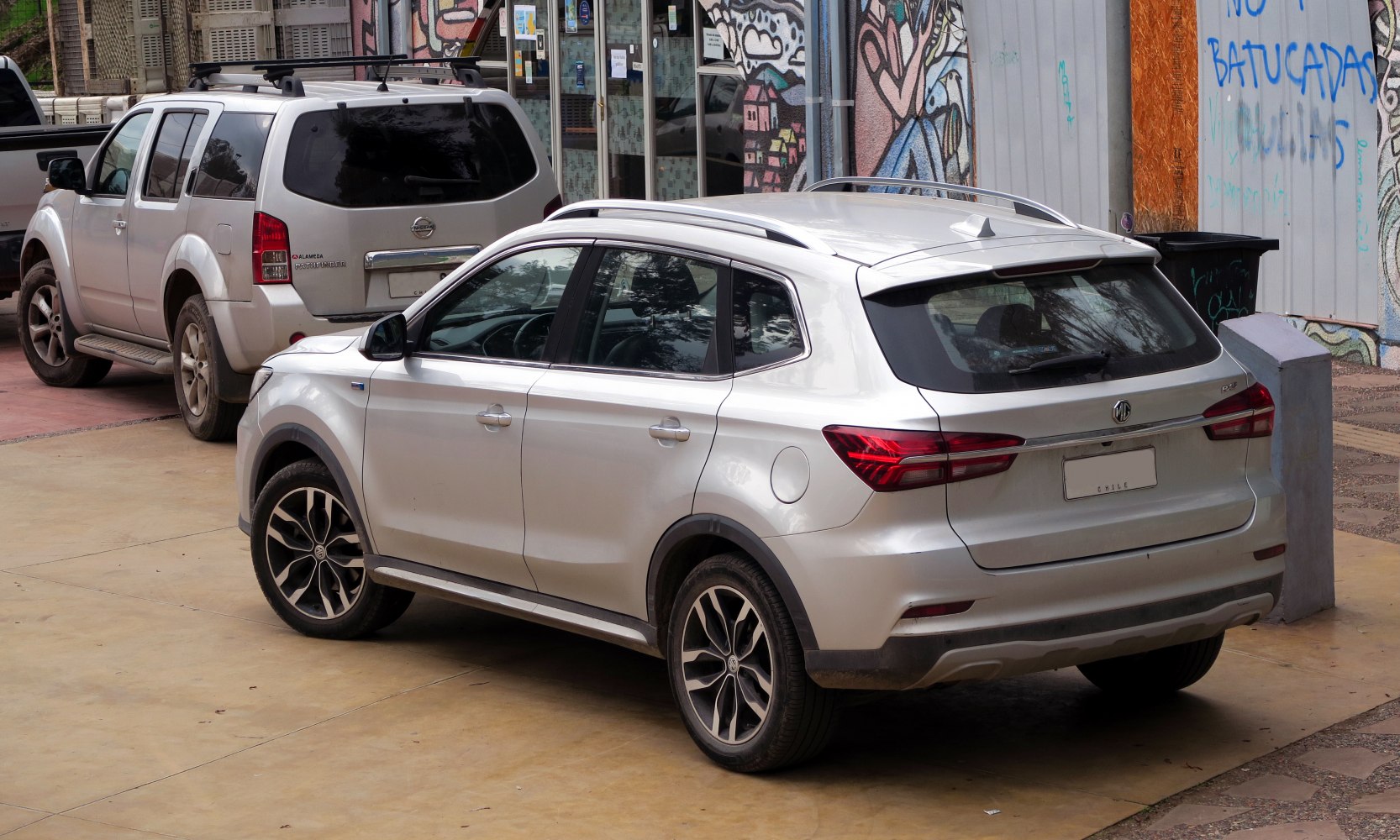 Rear and side view of a modern SUV with sleek taillights and alloy wheels
