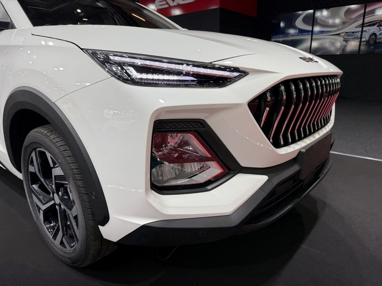 Front end with LED headlights and vertical slat grille