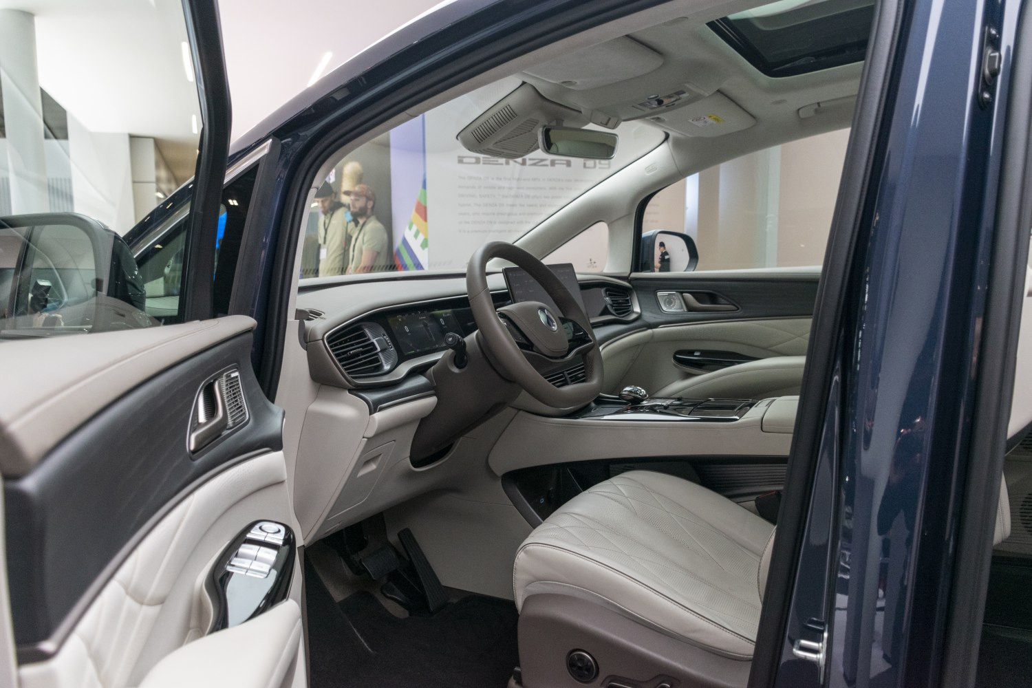 Luxurious vehicle interior with modern digital dashboard and leather seating
