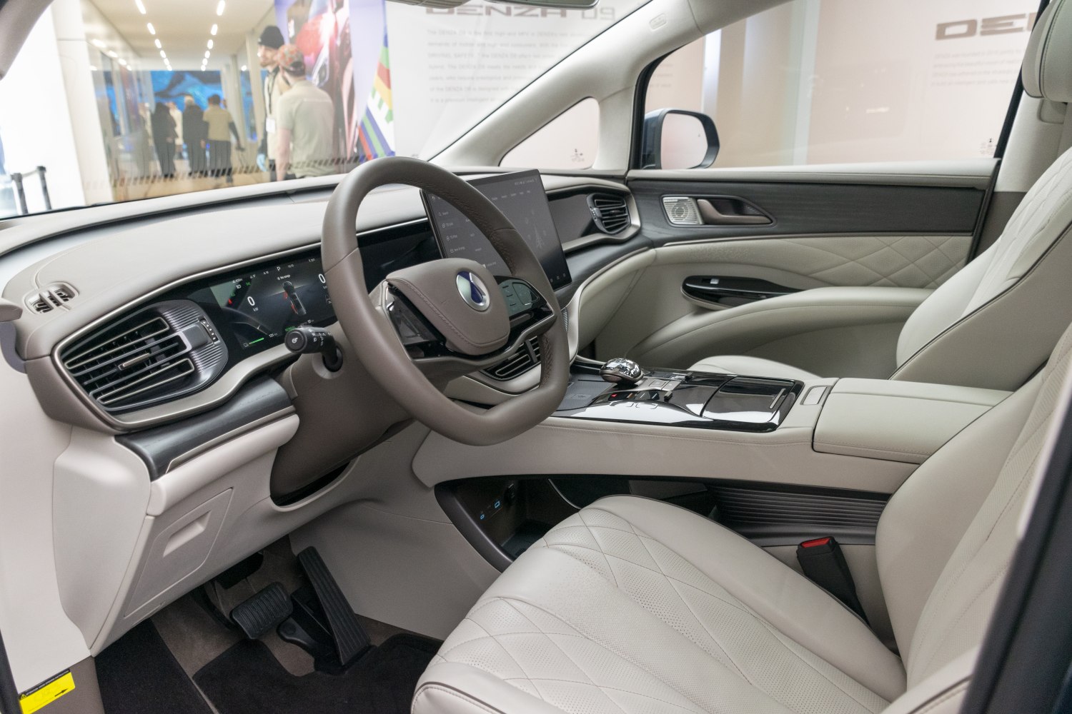 Modern luxury car interior with digital dashboard and leather seats