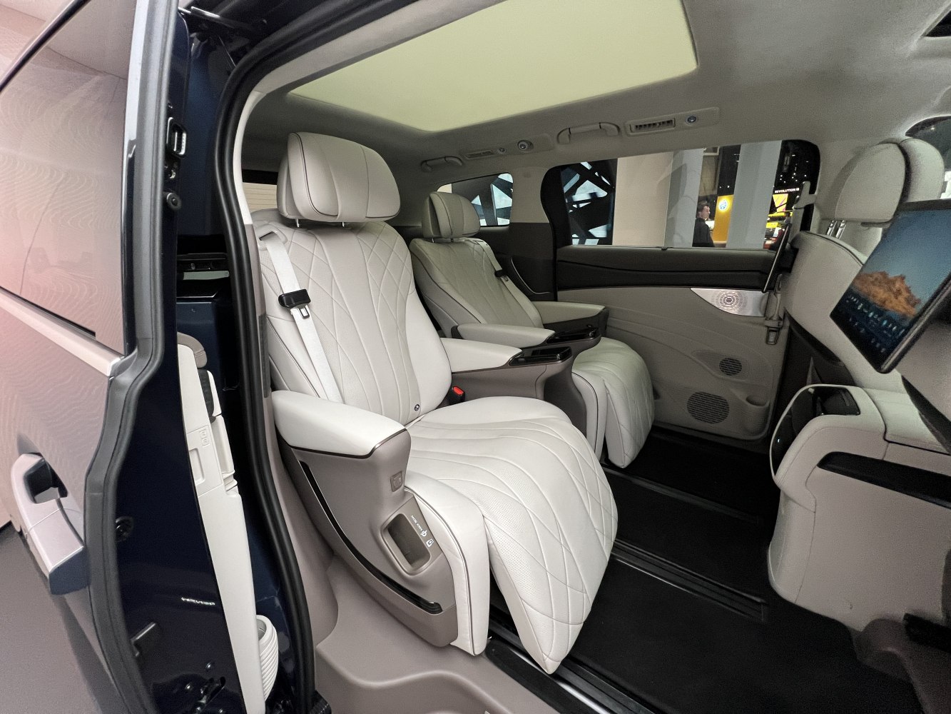 Luxurious reclining rear seats with quilted leather and panoramic sunroof
