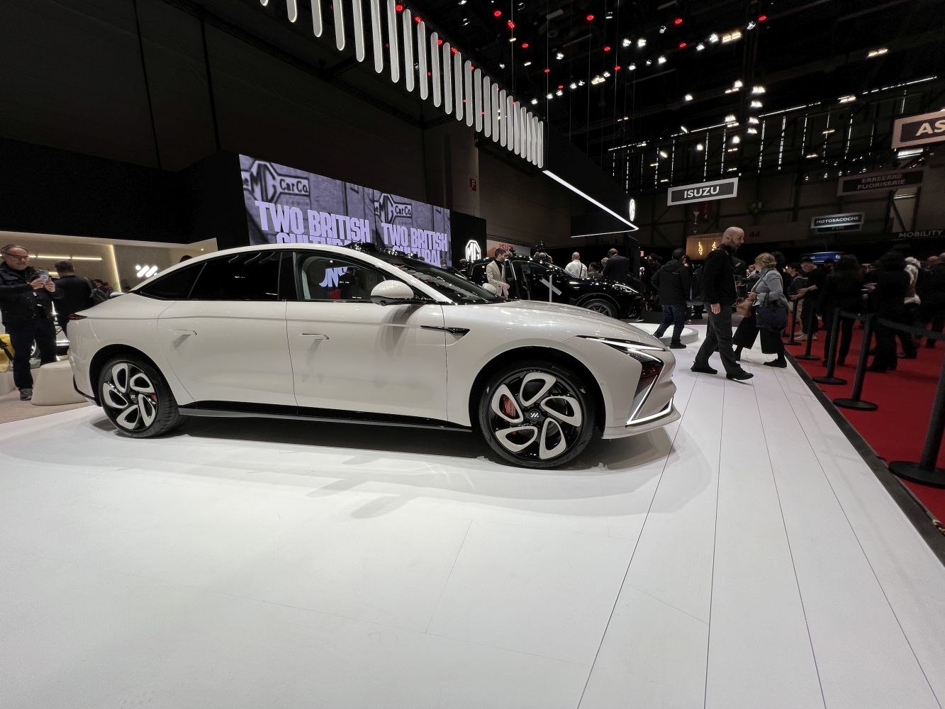 Sleek luxury sedan with sharp LED headlights and unique wheel design