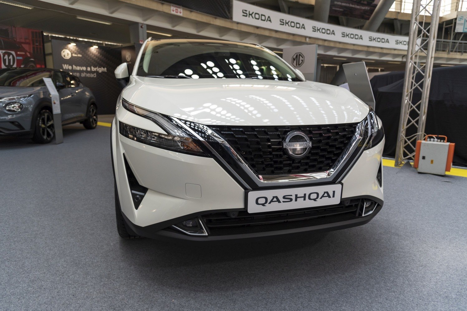 Front view of modern grille and headlights with chrome trim
