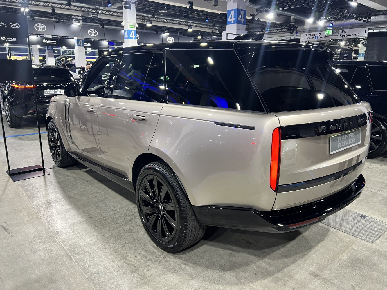 Rear and side profile with black accents and modern smoked taillights