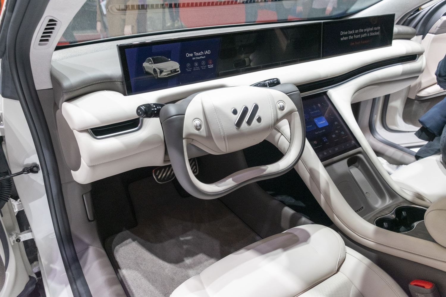 Futuristic digital dashboard with wide screen and innovative yoke steering