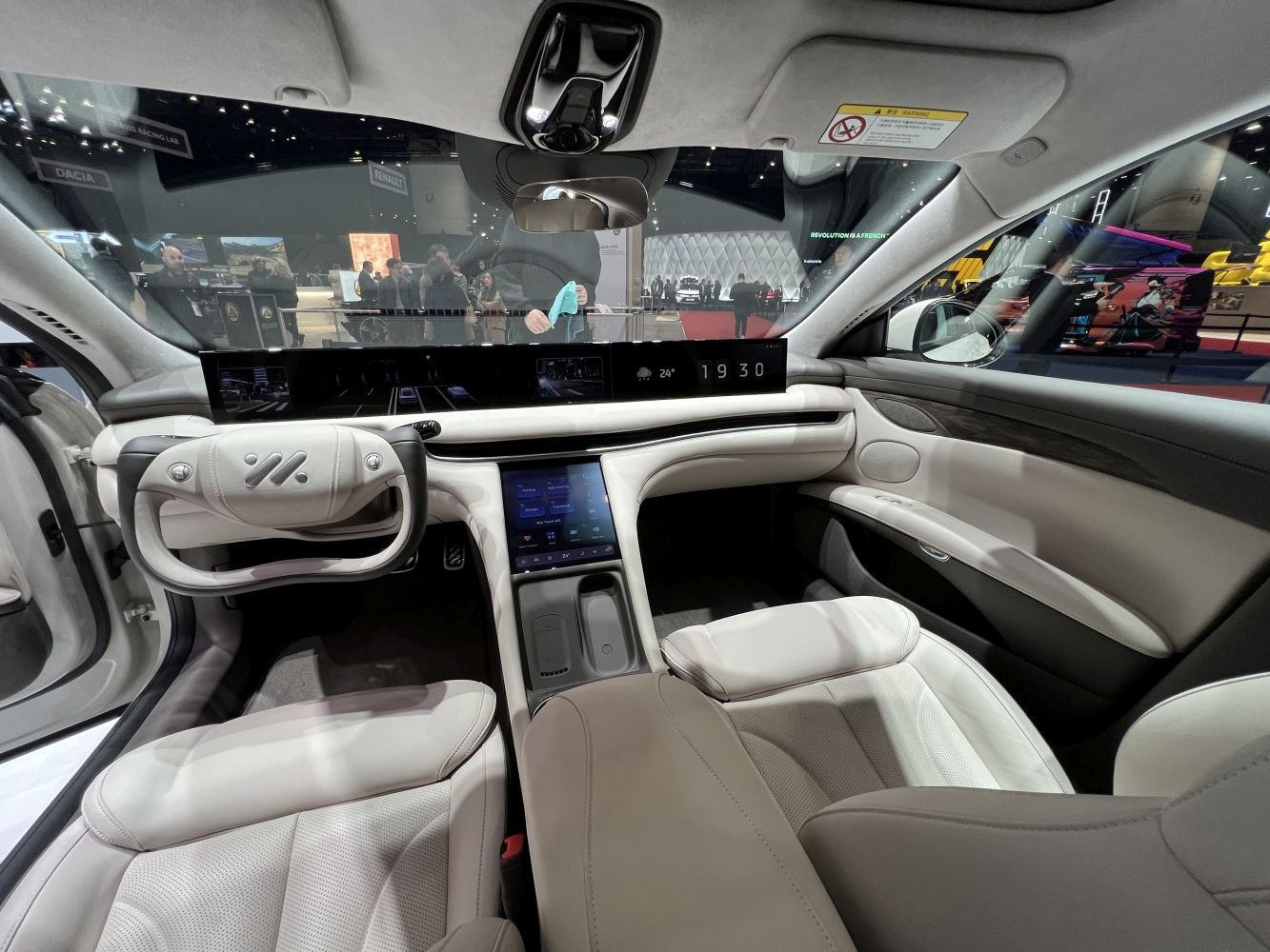 Ultra-wide digital dashboard and futuristic yoke steering wheel in luxury car interior