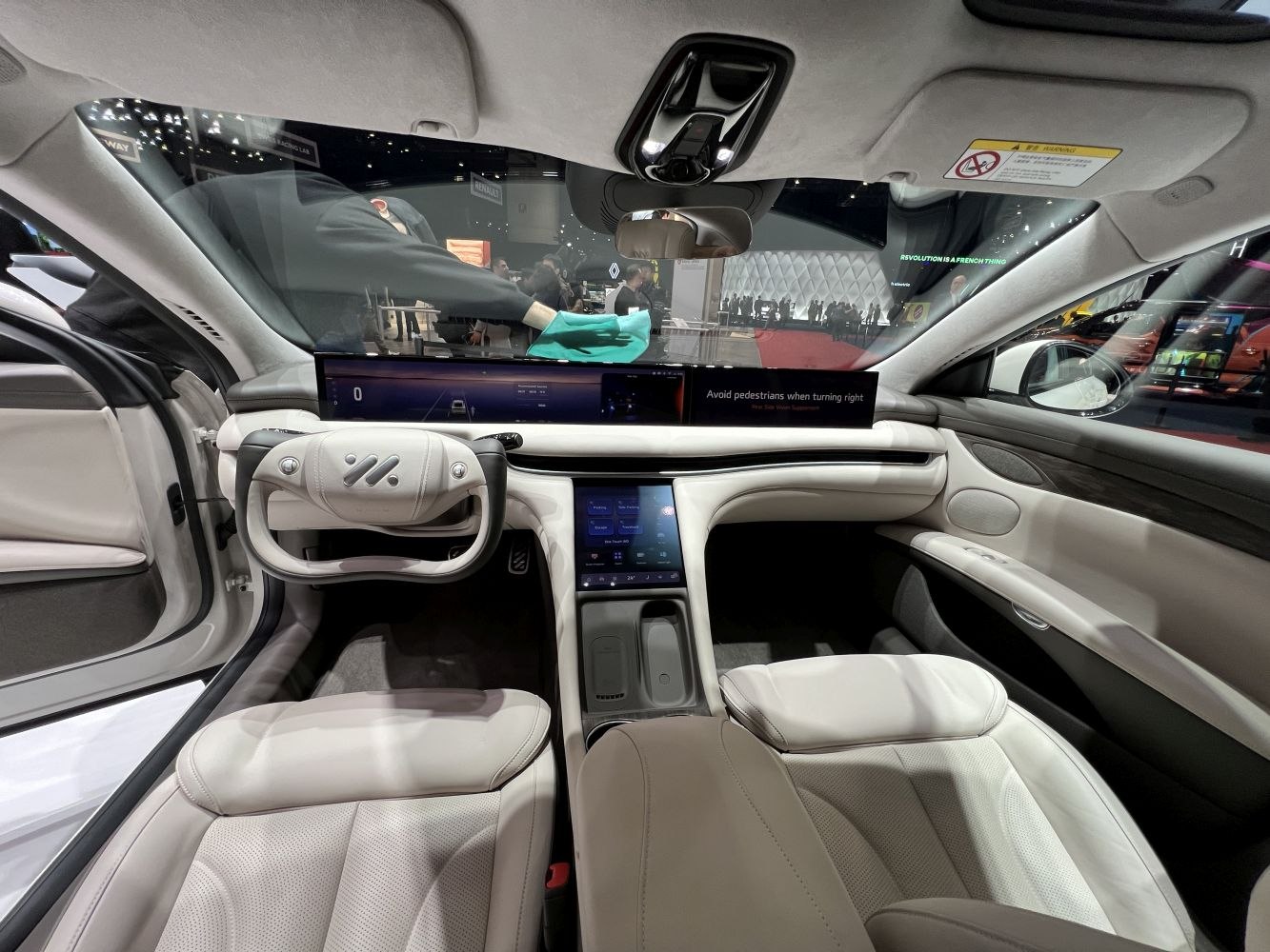 Digital dashboard and futuristic steering design in luxury car interior