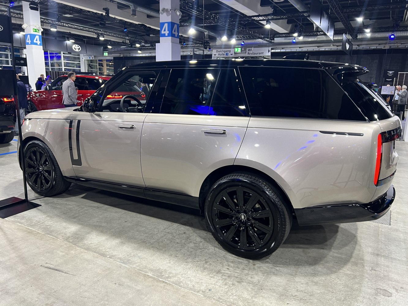 Sleek side profile with black alloy wheels of a modern SUV