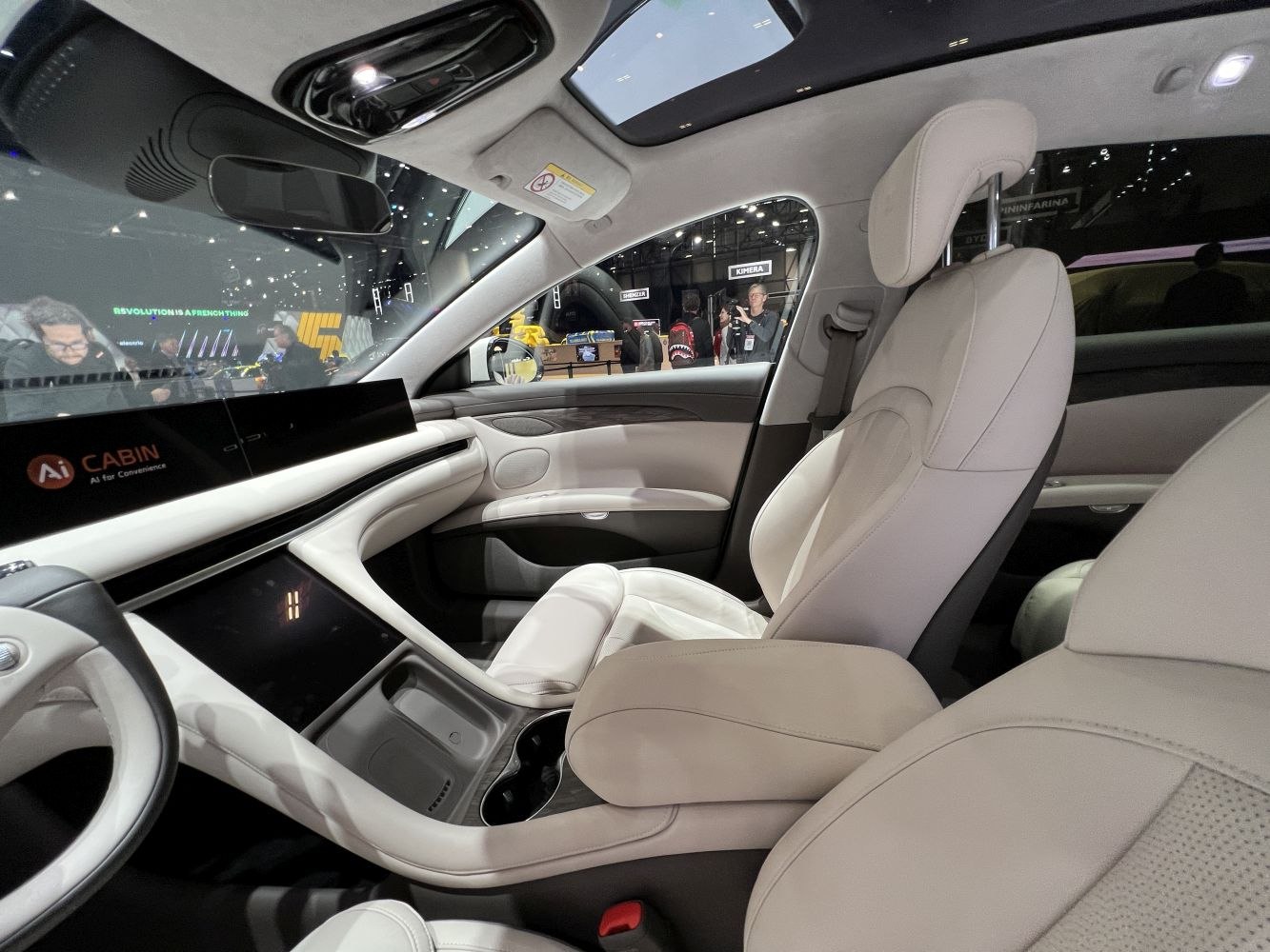 Luxurious car interior with panoramic sunroof and advanced digital displays
