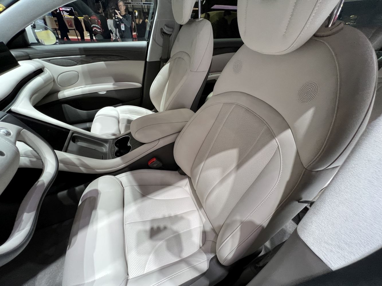 Luxurious leather front seats and sleek center console in modern vehicle interior