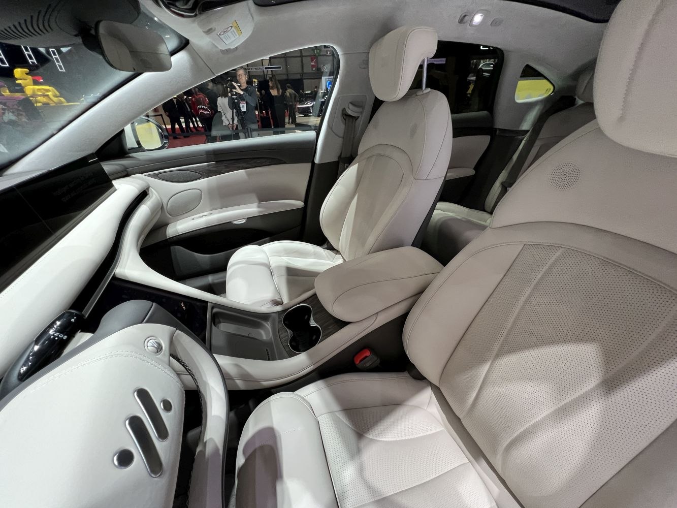 Luxury interior with white leather seats and advanced dashboard design