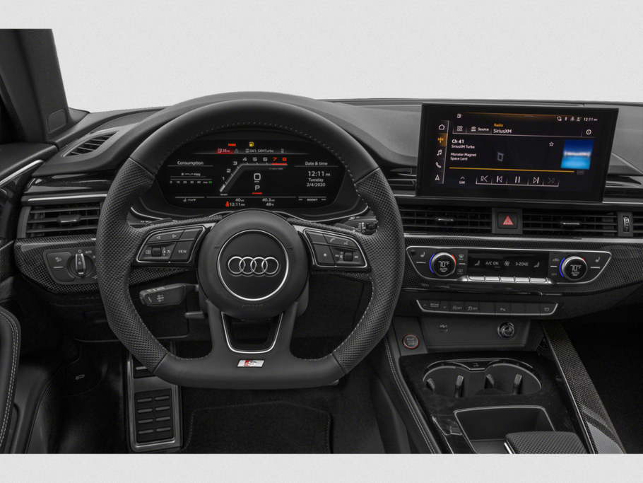 Modern digital dashboard and multifunctional steering wheel with touchscreen infotainment.