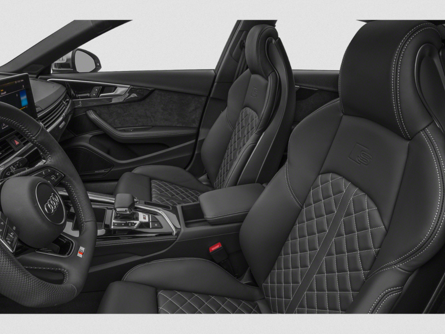 Quilted leather sports seats and modern Audi interior design with advanced controls.