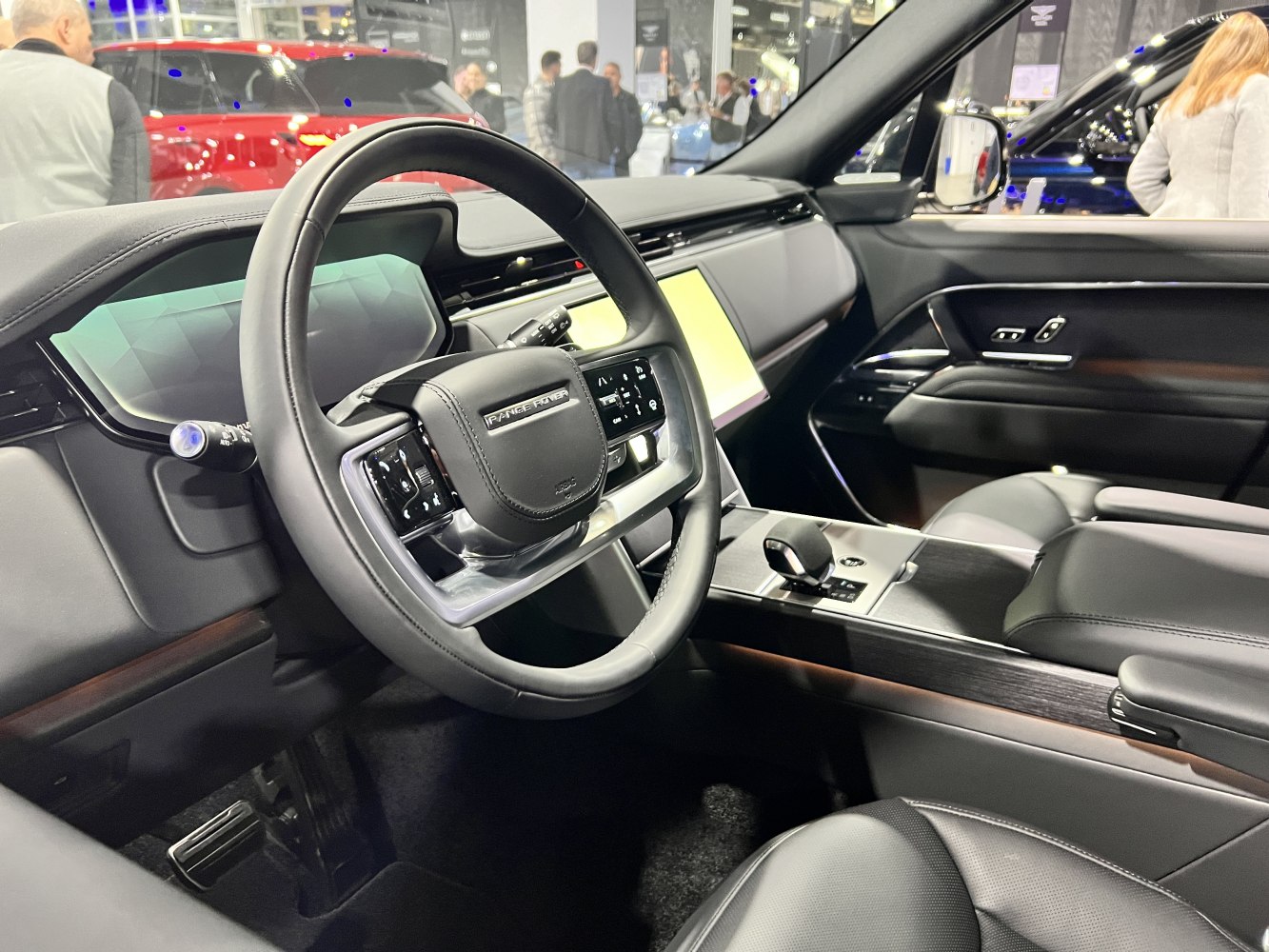 Digital dashboard and leather-wrapped steering wheel with premium center console