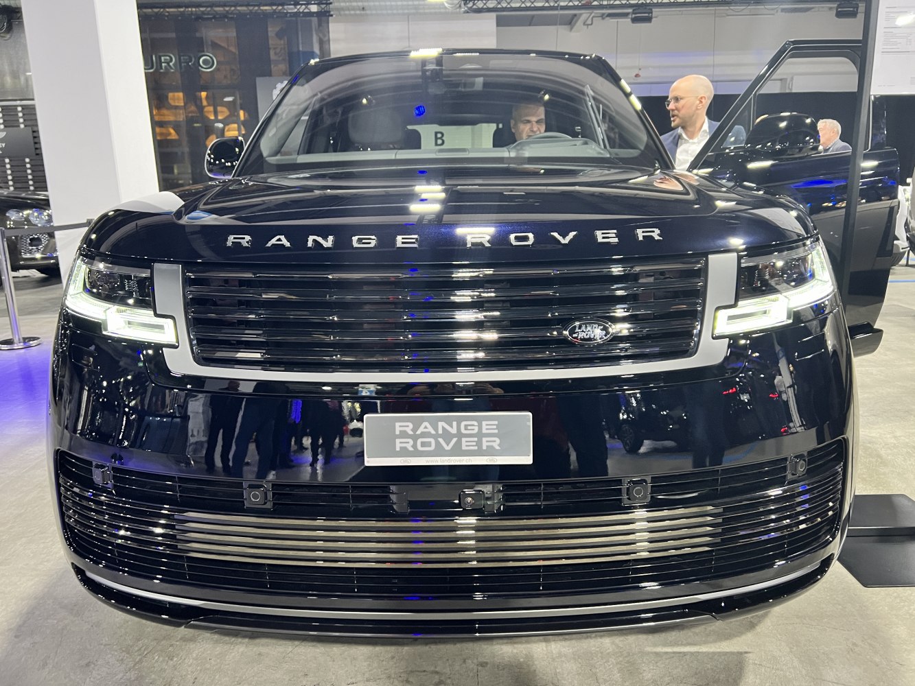 Front grille and LED headlights of a luxury SUV