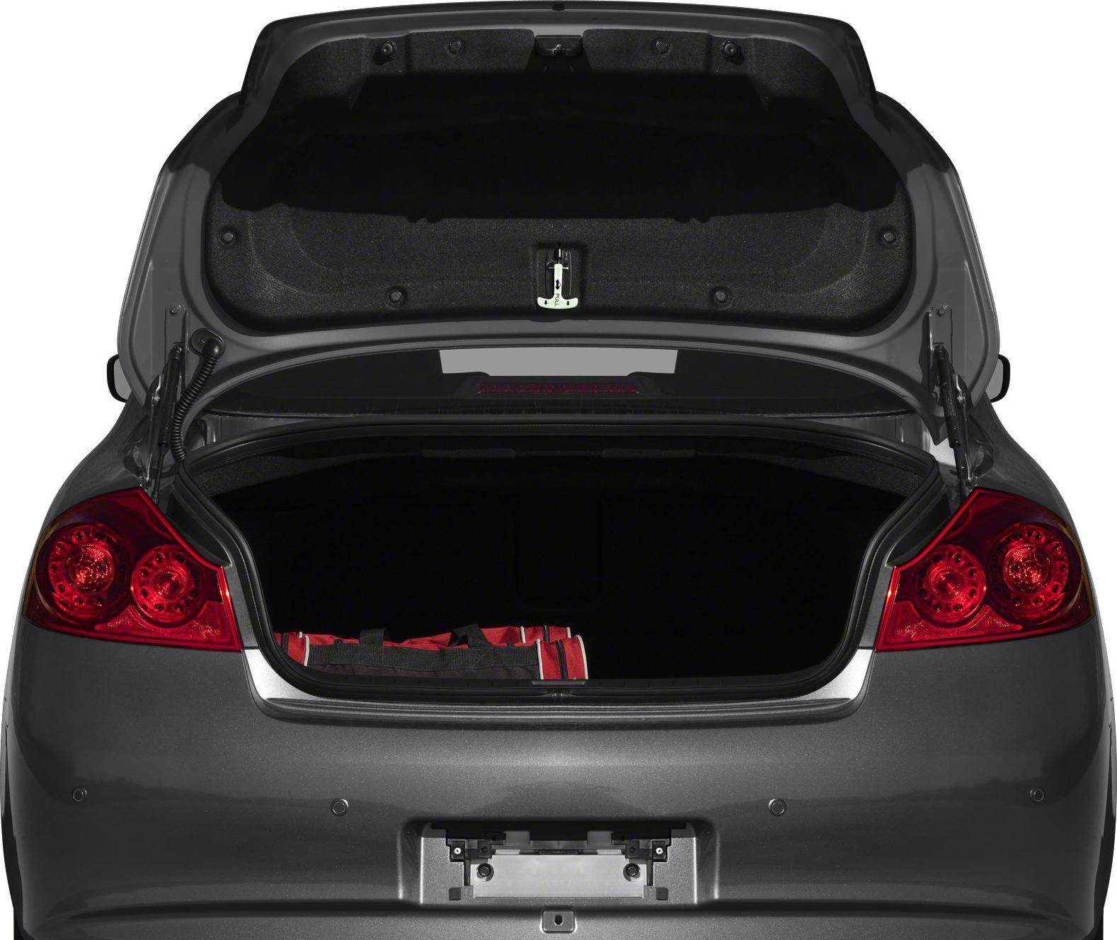 Open rear trunk with spacious cargo area and illuminated taillights