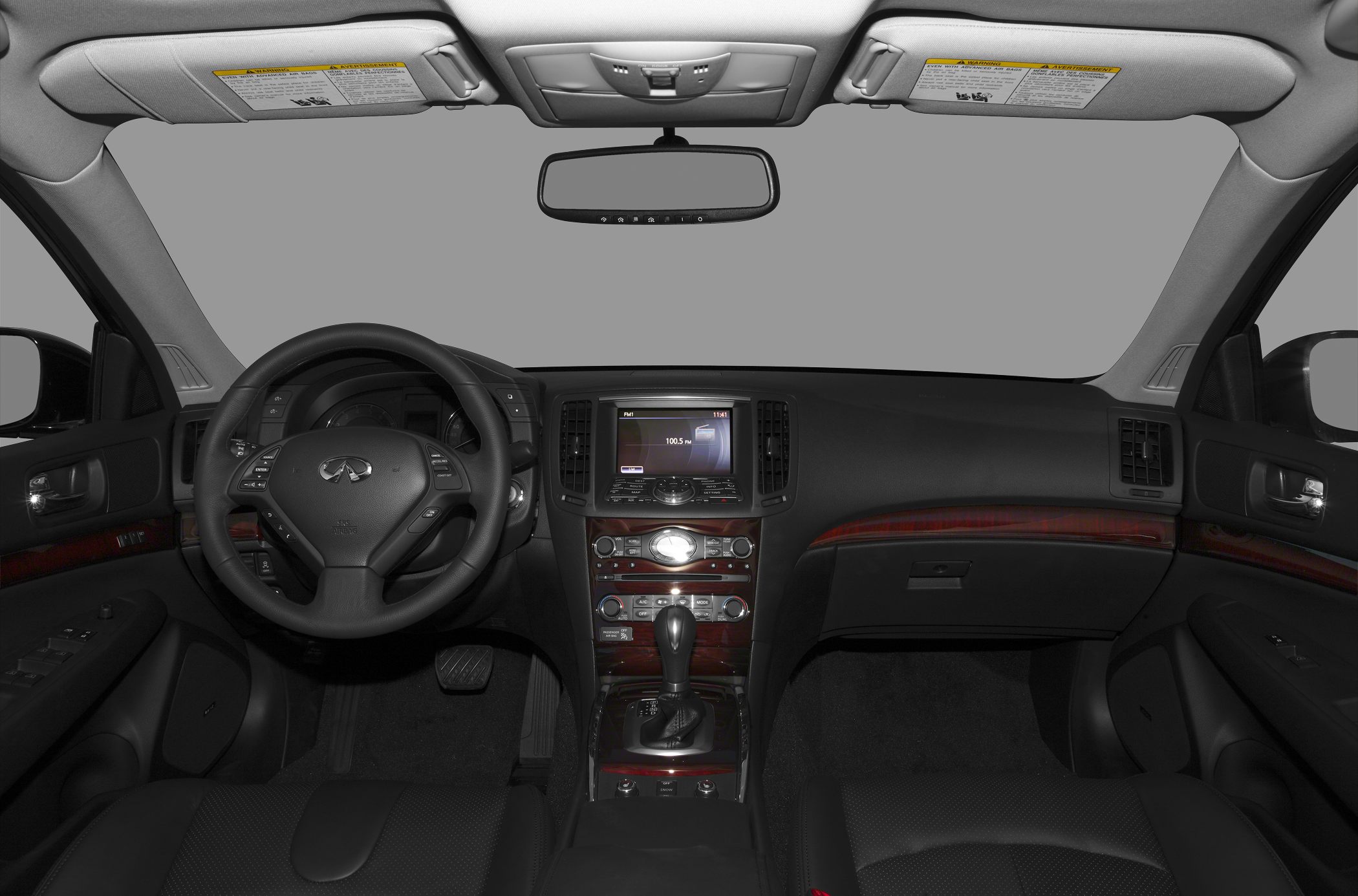 Interior view of dashboard, steering wheel, and center console