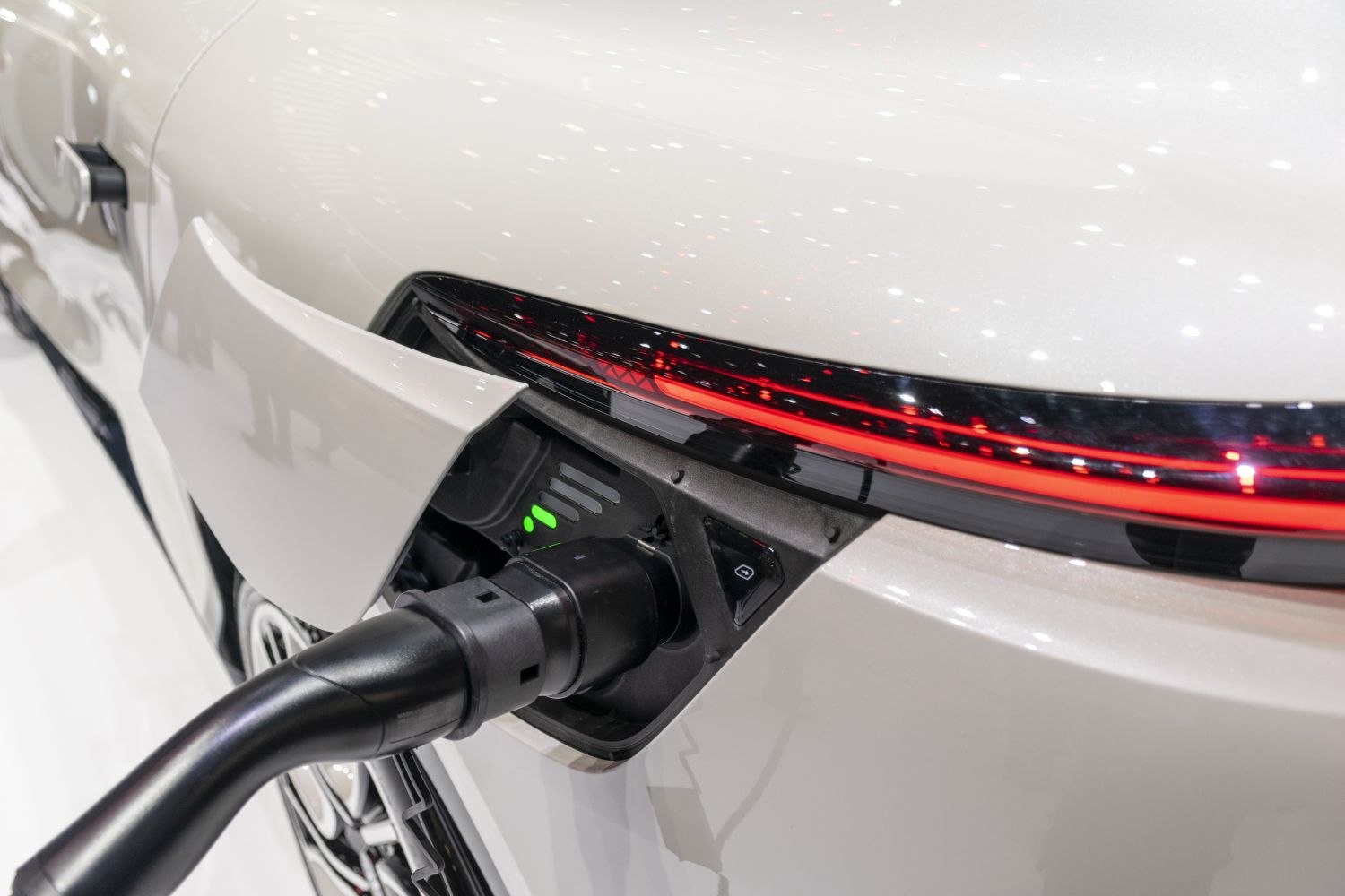 Electric charging port with rear LED light strip