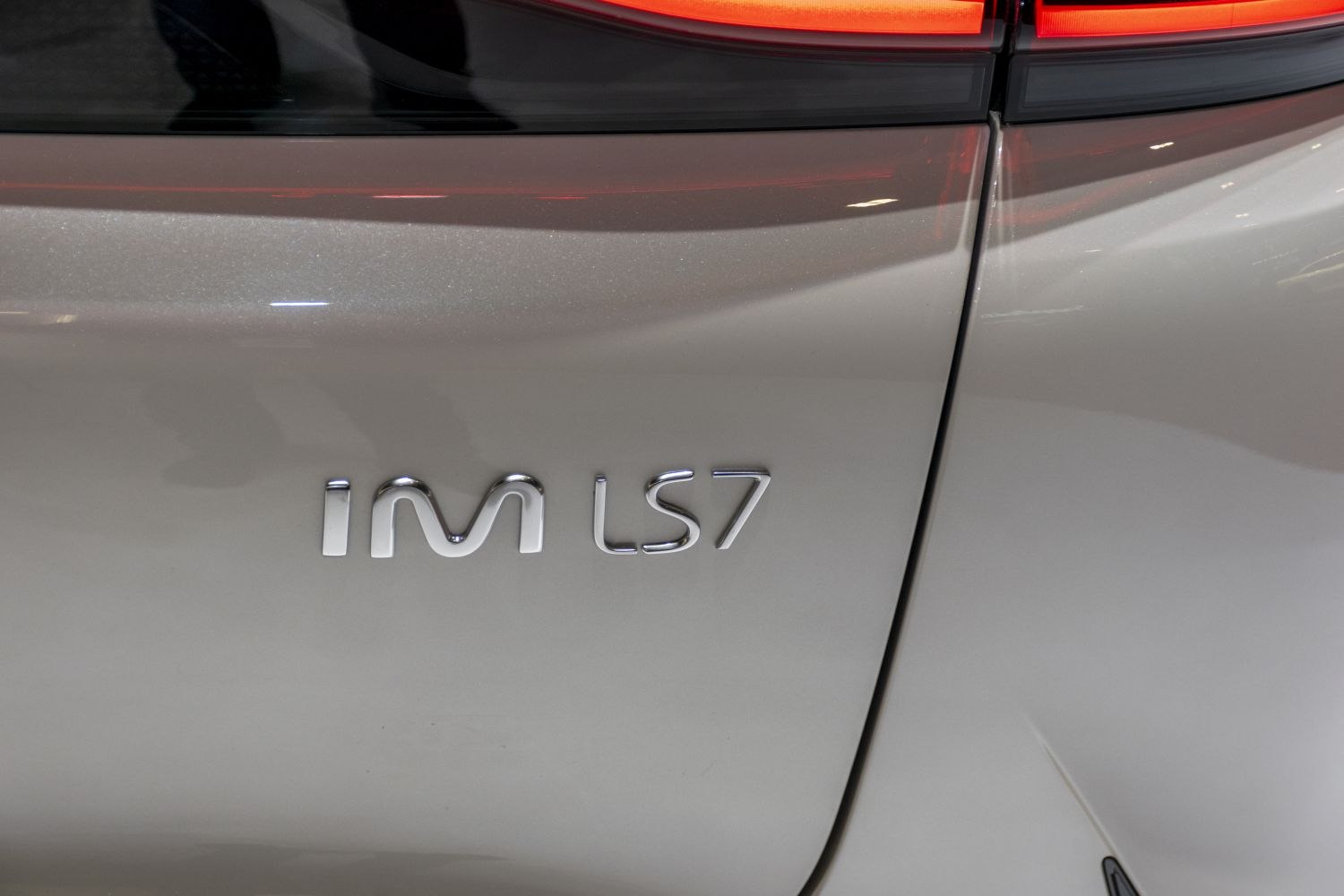Close-up of IM LS7 rear badge and car paint with tail light segment