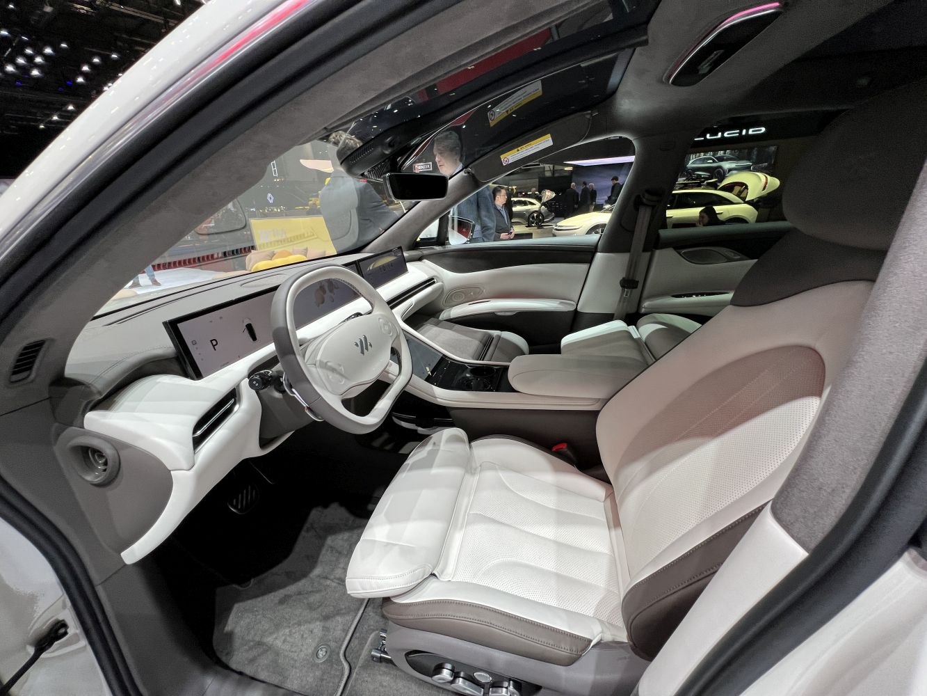 Advanced digital displays and premium seats in a modern car interior