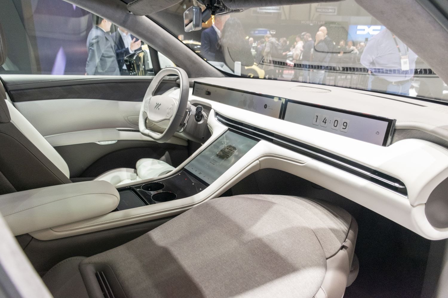 Futuristic car interior with panoramic digital dashboard and touchscreen console