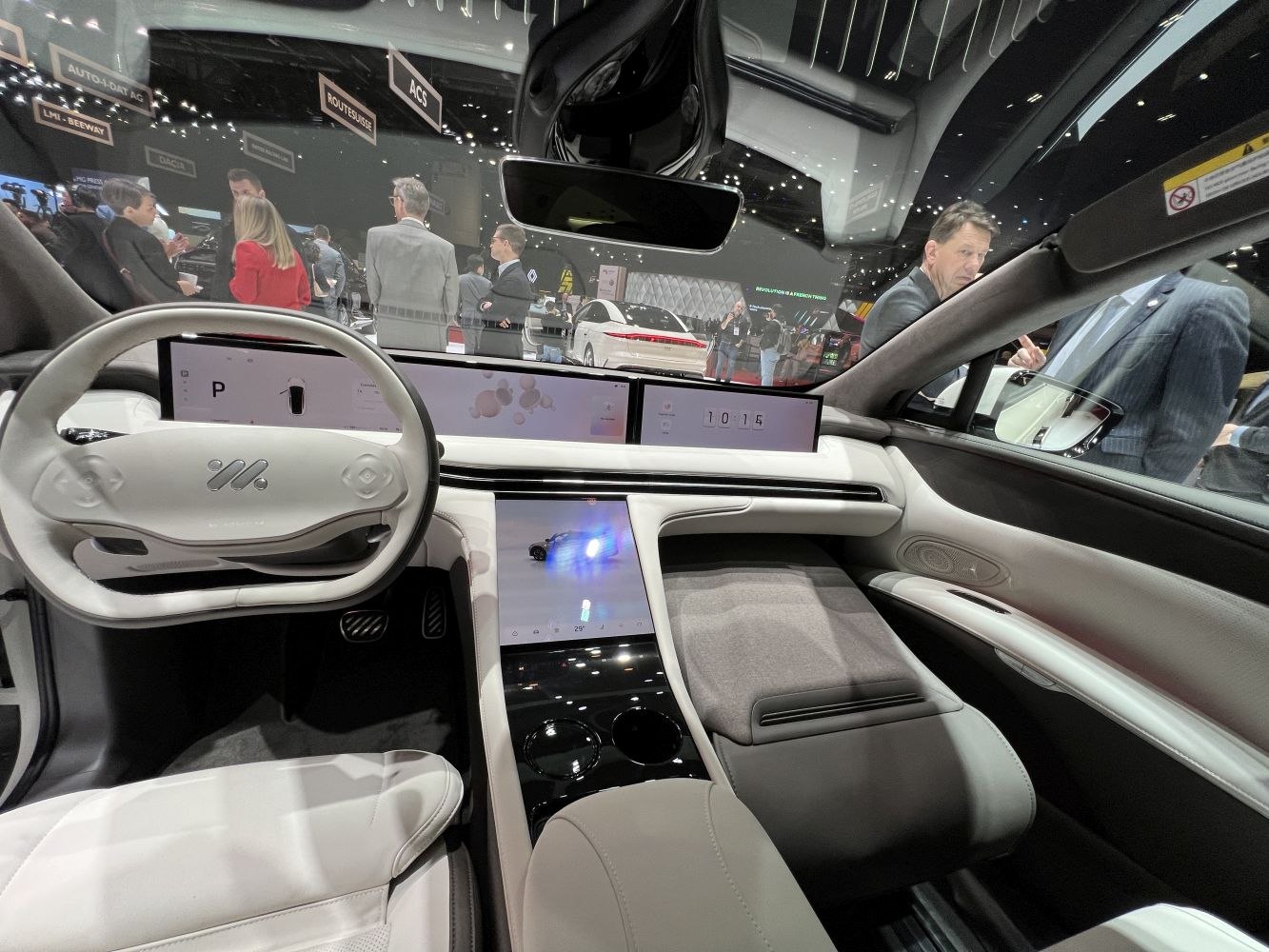 Digital dashboard with dual screens and unique steering wheel design