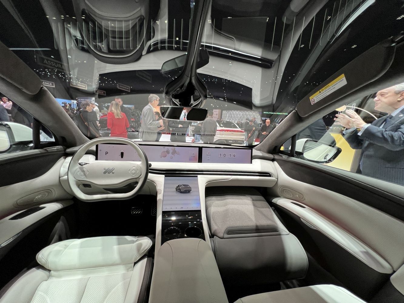 Futuristic dashboard, digital displays, panoramic glass roof