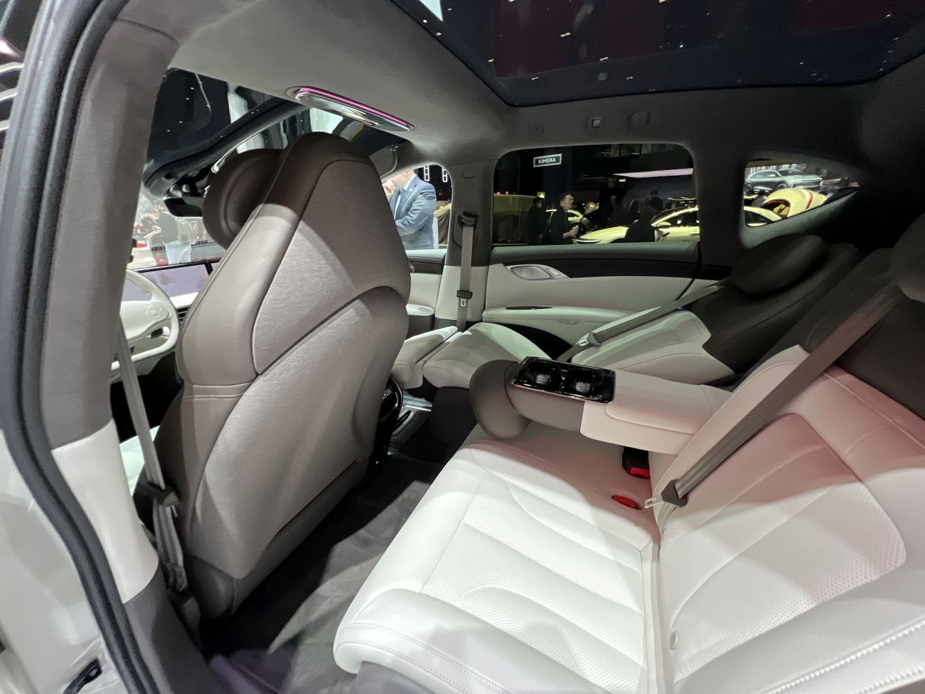 Premium rear seat interior with center armrest and controls