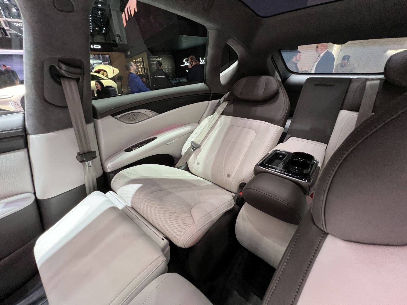 Luxury rear reclining seats with armrest and integrated cup holders